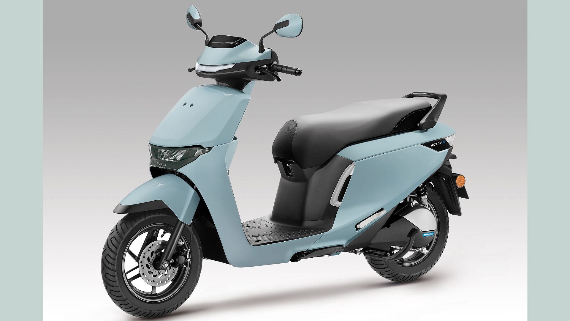 honda active e in light blue color
