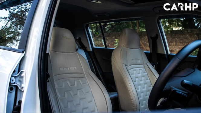 White 2023 Hyundai Exter Ownership Review Front Seats Interior Photograph