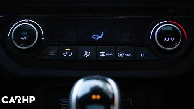 White 2023 Hyundai Exter Ownership Review Automatic AC Controls Interior Photograph